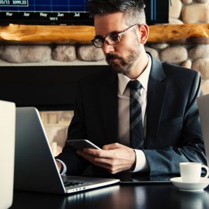 man-in-black-holding-phone-618613